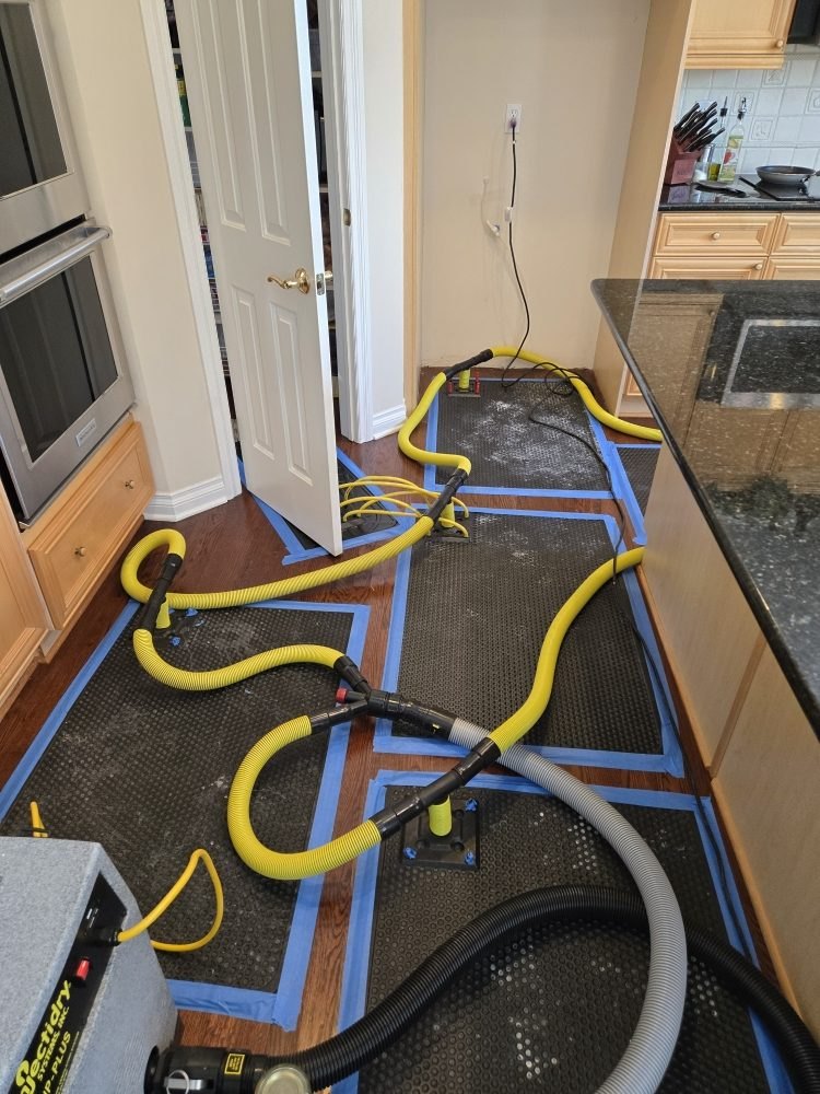 Hardwood Floor Drying System in Active Operation - DriForce Property Restoration, Birmingham, MI