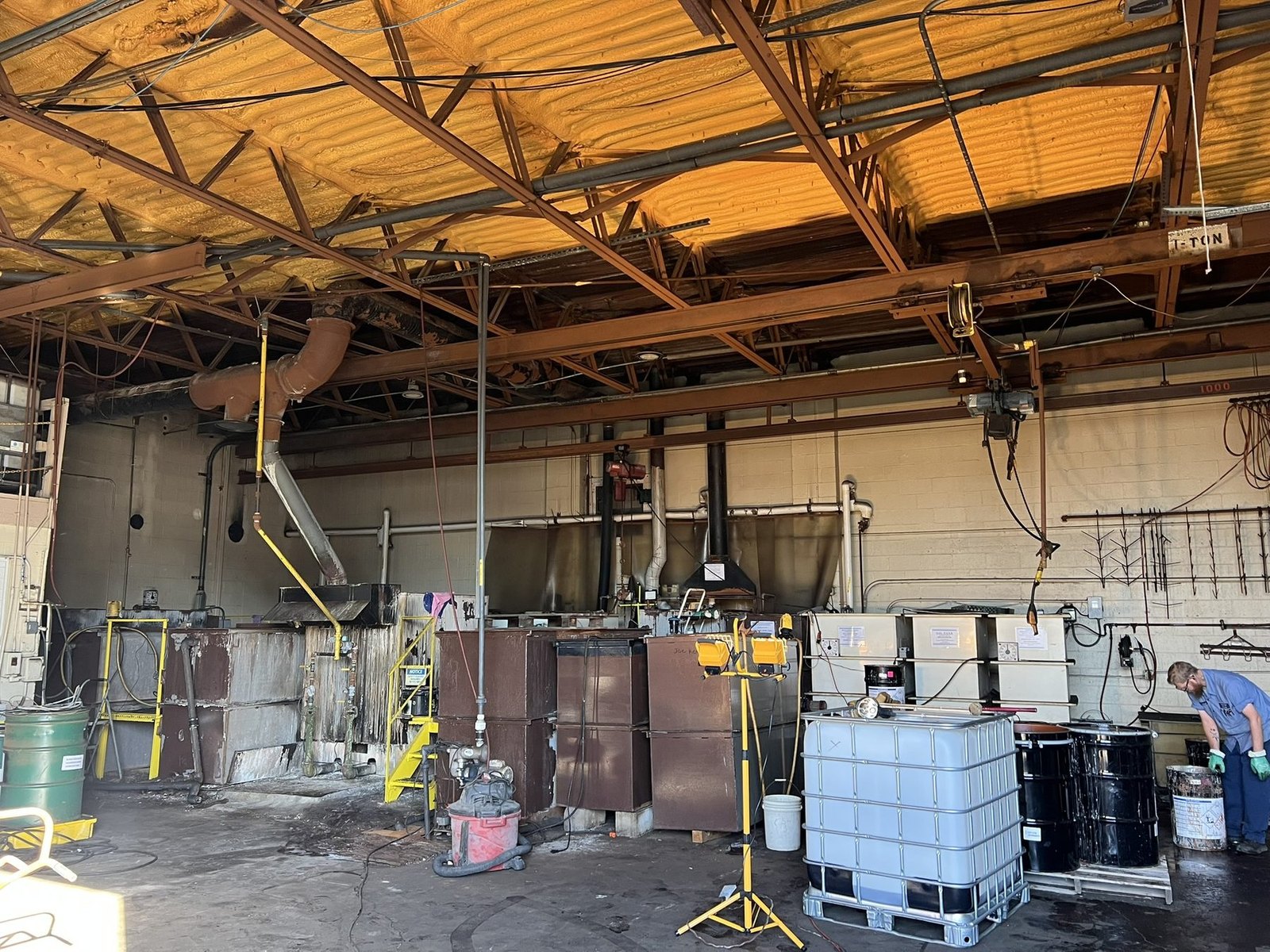DriForce crews working a large-loss commercial fire on an industrial plant floor