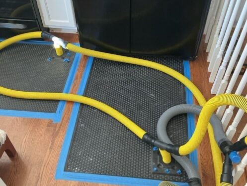 Structural Dryout: Sub-Floor Extraction in Progress - DriForce Property Restoration, Sterling Heights, MI