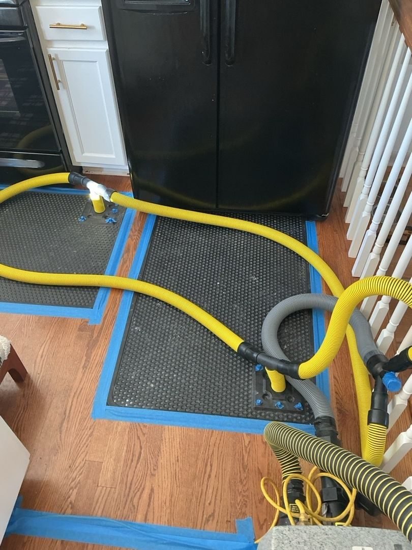 Structural Dryout: Sub-Floor Extraction in Progress - DriForce Property Restoration, Sterling Heights, MI