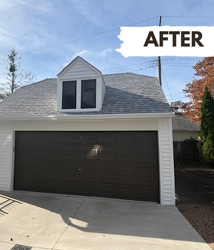 Same garage with new roof and siding after storm damage restoration by DriForce